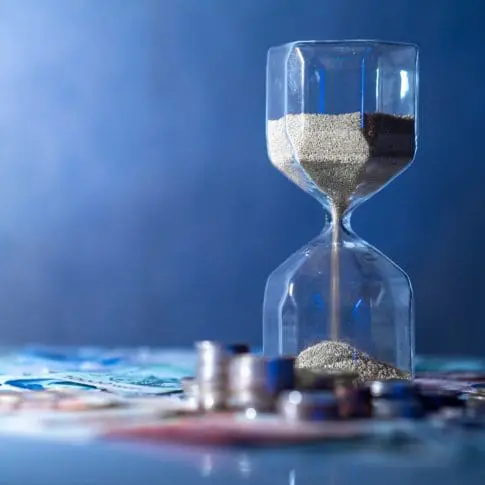 Hourglass and money - Tax policy