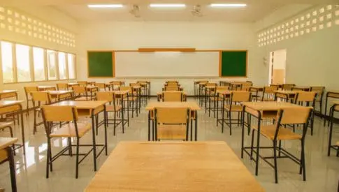 A school classroom without students represents declining school enrollment since the pandemic