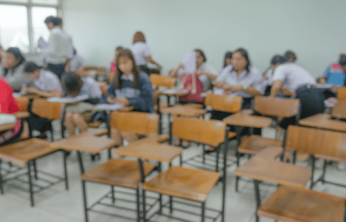 A public school classroom with too few students to fill all desks after enrollment declines