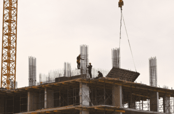 Construction workers on the job representing labor force