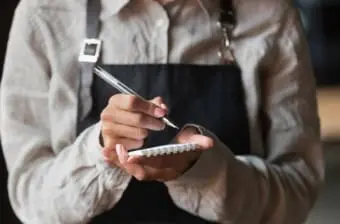 Service worker holds notepad