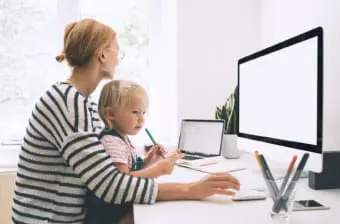 A mother working from home
