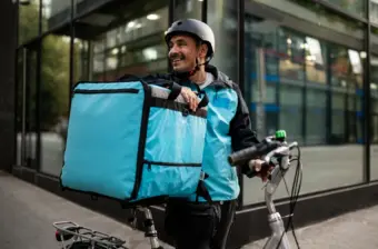 Food delivery worker on bike