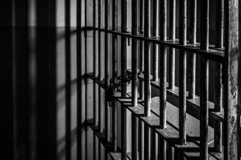 Bars of a private prison cell