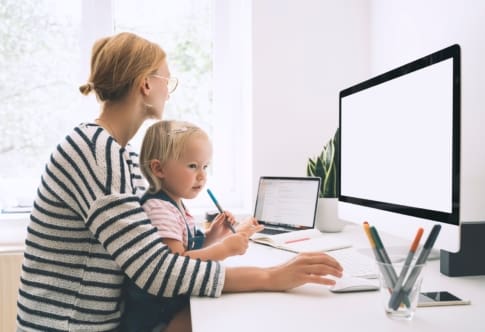 A mother working from home